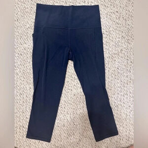 ATHLETA SALUTATION STASH Picket II HIGH RISE CAPRI Size: Small, color: Navy